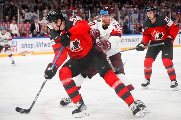 Tyler Myers 57, CAN and Miks Indrasis 70, LAT during the 2023 IIHF Ice hockey, Eishockey World Championship, WM, Weltmeisterschaft Semifinal match between Canada - Latvia at the Nokia Arena on 27. May 2023 in Tampere, Finland. (KALLE PARKKINEN Newspix24)  Copyright: xKallexParkkinenx np24271458265