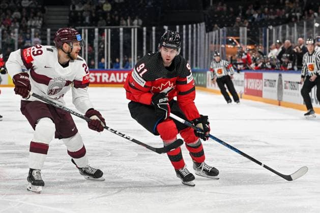 RIGA, LATVIA - MAY 27: Adam Fantilli of Canada in action against Ralfs Freibergs of Latvia during the 2023 IIHF Ice hockey, Eishockey World Championship, WM, Weltmeisterschaft Finland - Latvia game between Canada and Latvia at Nokia Arena on May 27, 2023 in Tampere, Finland. Tampere Finland Copyright: xJustPictures.ch AndreaxBrancax