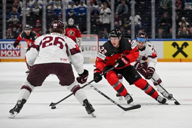RIGA, LATVIA - MAY 27: Jack Quinn of Canada in action against Deniss Smirnovs of Latvia and Uvis Janis Balinskis of Latvia during the 2023 IIHF Ice hockey, Eishockey World Championship, WM, Weltmeisterschaft Finland - Latvia game between Canada and Latvia at Nokia Arena on May 27, 2023 in Tampere, Finland. Tampere Finland Copyright: xJustPictures.ch AndreaxBrancax