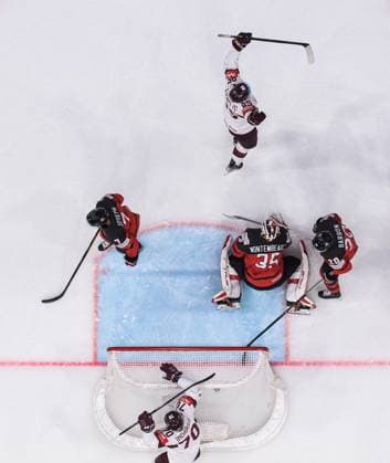 230527 Miks Indrasis and Dans Locmelis of Latvia celebrate the 0-1 goal behind goaltender Samuel Montembeault of Canada during the 2023 IIHF Ice hockey, Eishockey World Championship, WM, Weltmeisterschaft semifinal game between Canada and Latvia on May 27, 2023 in Tampere. Photo: Joel Marklund BILDBYRAN kod JM JM0485 bbeng ishockey ice hockey ishockey-vm 2023 ishockey-vm vm 2023 iihf ice hockey world championship semifinal semi-final kanada canada latvia lettland jubel depp Copyright: JOELxMARKLUND BB230527JM022