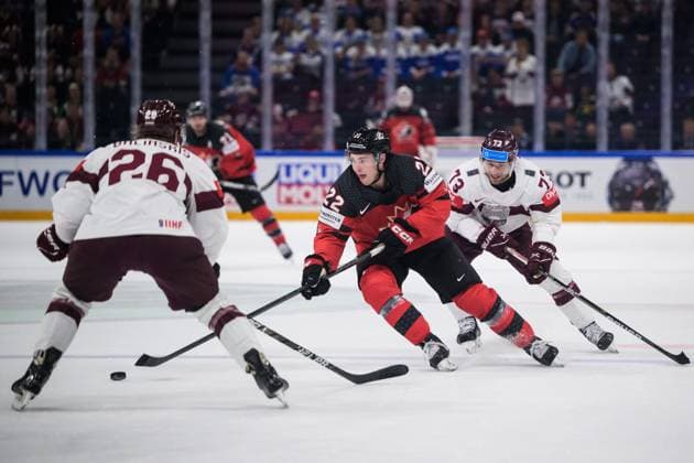 230527 Uvis Janis Balinskis and Deniss Smirnovs of Latvia are being challenged by Jack Quinn of Canada during the 2023 IIHF Ice hockey, Eishockey World Championship, WM, Weltmeisterschaft semifinal game between Canada and Latvia on May 27, 2023 in Tampere. Photo: Joel Marklund BILDBYRAN kod JM JM0485 bbeng ishockey ice hockey ishockey-vm 2023 ishockey-vm vm 2023 iihf ice hockey world championship semifinal semi-final kanada canada latvia lettland Copyright: JOELxMARKLUND BB230527JM023