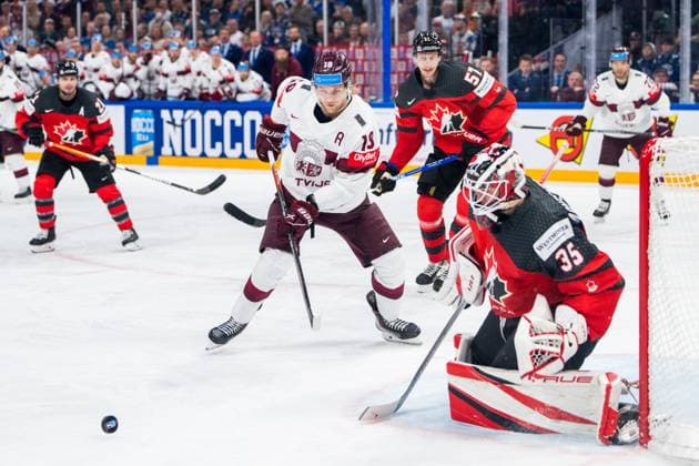 RIGA, LATVIA - MAY 27: Rodrigo Abols of Latvia (L) against goalkeeper Samuel Montembeault of Canada (R) into the slot during the 2023 IIHF Ice hockey, Eishockey World Championship, WM, Weltmeisterschaft Finland - Latvia game between Canada and Latvia at Nokia Arena on May 27, 2023 in Tampere, Finland. Tampere Finland Copyright: xJustPictures.ch JarixPestelaccix