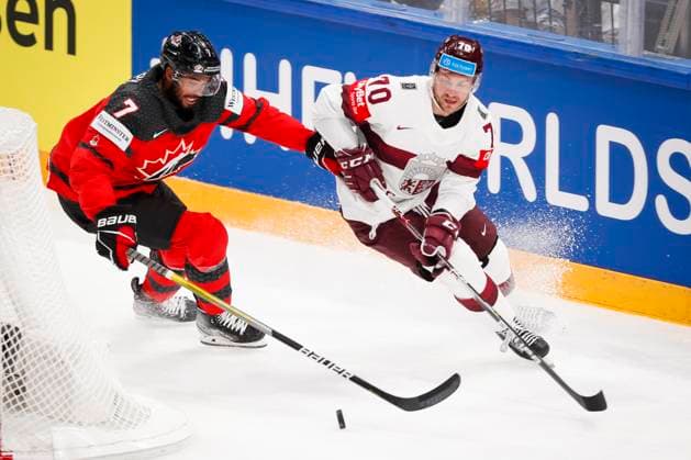 Sport Bilder des Tages Pierre-Olivier Joseph 7, CAN and Miks Indrasis 70, LAT during the 2023 IIHF Ice hockey, Eishockey World Championship, WM, Weltmeisterschaft Semifinal match between Canada - Latvia at the Nokia Arena on 27. May 2023 in Tampere, Finland. (KALLE PARKKINEN Newspix24)  Copyright: xKallexParkkinenx np24271558284