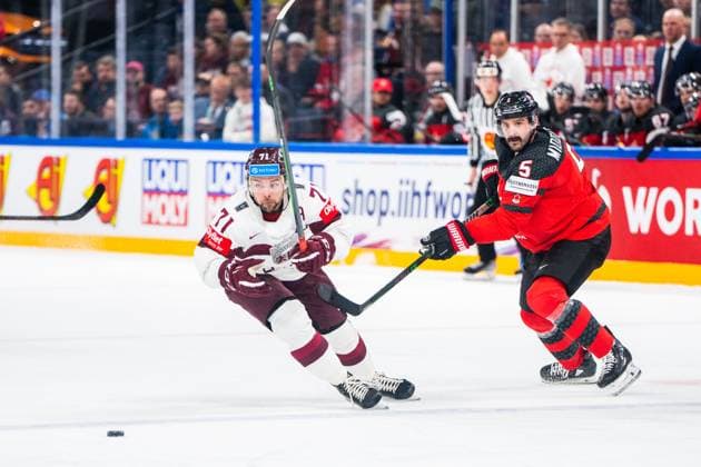 RIGA, LATVIA - MAY 27: Roberts Bukarts of Latvia (L) against Jacob Middleton of Canada (R) during the 2023 IIHF Ice hockey, Eishockey World Championship, WM, Weltmeisterschaft Finland - Latvia game between Canada and Latvia at Nokia Arena on May 27, 2023 in Tampere, Finland. Tampere Finland Copyright: xJustPictures.ch JarixPestelaccix