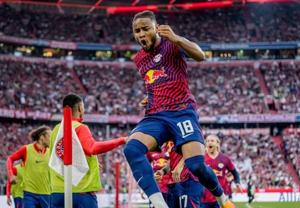 Leipzigs Christopher Nkunku jubelt nach seinem Treffer zum 2:1. Fussball 1. Bundesliga, 33. Spieltag: FC Bayern Muenchen - RB Leipzig 1:3. 20. Mai 2023: Muenchen, Allianz Arena. FC Bayern Muenchen - RB Leipzig 1:3
