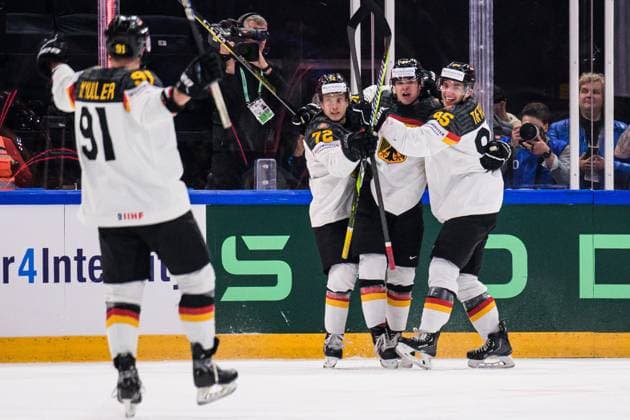 Eishockey, WM, Finale, Kanada - Deutschland 230528 Moritz Müller, Dominik Kahun, John Peterka and Frederik Tiffels of Germany celebrate the 0-1 goal during the 2023 IIHF Ice hockey, Eishockey World Championship, WM, Weltmeisterschaft final game between Canada and Germany on May 28, 2023 in Tampere. Photo: Joel Marklund BILDBYRAN kod JM JM0489 bbeng ishockey ice hockey ishockey-vm 2023 ishockey-vm vm 2023 iihf ice hockey world championship final kanada canada germany tyskland jubel Copyright: JOELxMARKLUND BB230528JM110