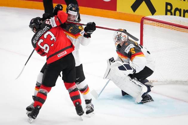 Eishockey, WM, Finale, Kanada - Deutschland Jake Neighbours 63, CAN, Moritz Müller 91, GER and Mathias Niederberger 35, GER during the 2023 IIHF Ice hockey, Eishockey World Championship, WM, Weltmeisterschaft gold medal match between Canada - Germany at the Nokia Arena on 28. May 2023 in Tampere, Finland. (KALLE PARKKINEN Newspix24) Copyright: xKallexParkkinenx np24282058545