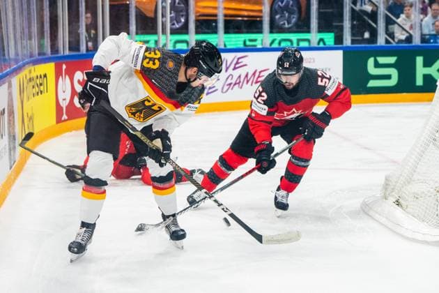 Eishockey, WM, Finale, Kanada - Deutschland TAMPERE, FINLAND - MAY 28: John Peterka of Germany (L) against MacKenzie Weegar of Canada (R) during the 2023 IIHF Ice hockey, Eishockey World Championship, WM, Weltmeisterschaft Finland - Latvia game between Canada and Germany at Nokia Arena on May 28, 2023 in Tampere, Finland. Tampere Nokia Arena Finland Copyright: xJustPictures.ch JarixPestelaccix