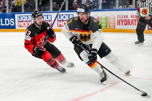 Eishockey, WM, Finale, Kanada - Deutschland TAMPERE, FINLAND - MAY 28: Maximilian Kastner of Germany protects the puck against Michael Carcone of Canada during the 2023 IIHF Ice hockey, Eishockey World Championship, WM, Weltmeisterschaft Finland - Latvia game between Canada and Germany at Nokia Arena on May 28, 2023 in Tampere, Finland. Tampere Nokia Arena Finland Copyright: xJustPictures.ch AndreaxBrancax