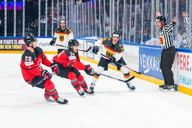 Eishockey, WM, Finale, Kanada - Deutschland TAMPERE, FINLAND - MAY 28: Justin Schutz of Germany (R) pinch the puck to the corner during the 2023 IIHF Ice hockey, Eishockey World Championship, WM, Weltmeisterschaft Finland - Latvia game between Canada and Germany at Nokia Arena on May 28, 2023 in Tampere, Finland. Tampere Nokia Arena Finland Copyright: xJustPictures.ch JarixPestelaccix