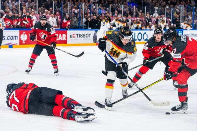 Eishockey, WM, Finale, Kanada - Deutschland TAMPERE, FINLAND - MAY 28: Parker Tuomie of Germany (C) stoped by Tyler Myers of Canada (L) and Pierre-Olivier Joseph of Canada (R) during the 2023 IIHF Ice hockey, Eishockey World Championship, WM, Weltmeisterschaft Finland - Latvia game between Canada and Germany at Nokia Arena on May 28, 2023 in Tampere, Finland. Tampere Nokia Arena Finland Copyright: xJustPictures.ch JarixPestelaccix