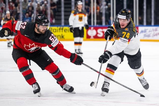 Eishockey, WM, Finale, Kanada - Deutschland 230528 MacKenzie Weegar of Canada and Justin Schutz of Germany during the 2023 IIHF Ice hockey, Eishockey World Championship, WM, Weltmeisterschaft final game between Canada and Germany on May 28, 2023 in Tampere. Photo: Joel Marklund BILDBYRAN kod JM JM0489 bbeng ishockey ice hockey ishockey-vm 2023 ishockey-vm vm 2023 iihf ice hockey world championship final kanada canada germany tyskland Copyright: JOELxMARKLUND BB230528JM116