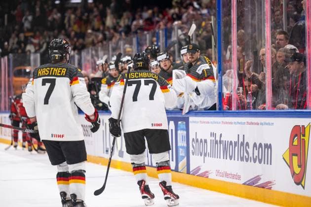 230528 Daniel Fischbuch of Germany celebrates with teammates after scoring 1-2 during the 2023 IIHF Ice hockey, Eishockey World Championship, WM, Weltmeisterschaft final game between Canada and Germany on May 28, 2023 in Tampere. Photo: Joel Marklund BILDBYRAN kod JM JM0489 bbeng ishockey ice hockey ishockey-vm 2023 ishockey-vm vm 2023 iihf ice hockey world championship final kanada canada germany tyskland jubel Copyright: JOELxMARKLUND BB230528JM122
