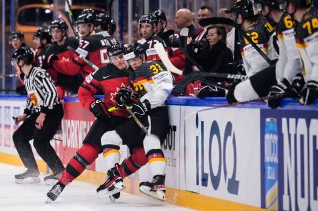 230528 Samuel Blais of Canada tackles John Peterka of Germany during the 2023 IIHF Ice hockey, Eishockey World Championship, WM, Weltmeisterschaft final game between Canada and Germany on May 28, 2023 in Tampere. Photo: Joel Marklund BILDBYRAN kod JM JM0489 bbeng ishockey ice hockey ishockey-vm 2023 ishockey-vm vm 2023 iihf ice hockey world championship final kanada canada germany tyskland Copyright: JOELxMARKLUND BB230528JM128