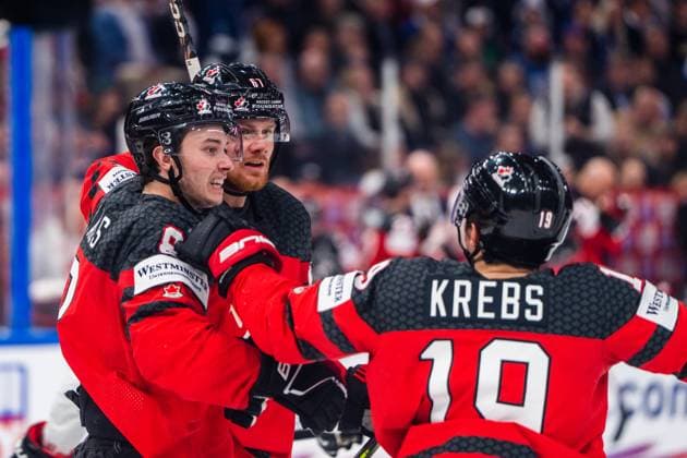TAMPERE, FINLAND - MAY 28: Lawson Crouse of Canada (C) celebrated by Cody Glass of Canada (L) and Peyton Krebs of Canada (R) for his goal during the 2023 IIHF Ice hockey, Eishockey World Championship, WM, Weltmeisterschaft Finland - Latvia game between Canada and Germany at Nokia Arena on May 28, 2023 in Tampere, Finland. Tampere Nokia Arena Finland Copyright: xJustPictures.ch JarixPestelaccix
