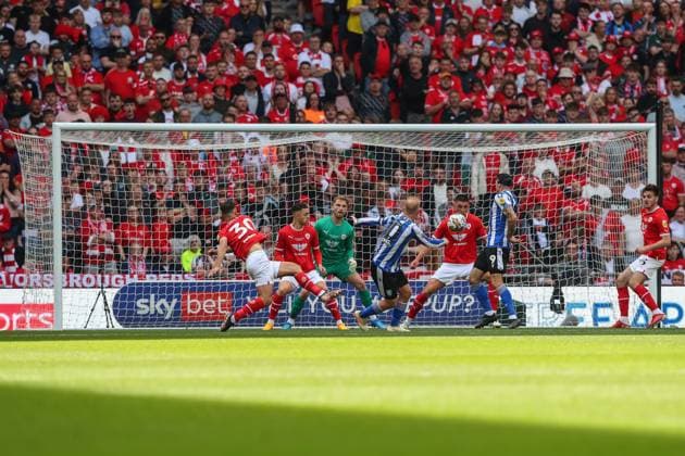 Sky Bet League 1 Play-off Final Barnsley v Sheffield Wednesday Barry Bannan 10 of Sheffield Wednesday has his shot blocked by Bobby Thomas 12 of Barnsley during the Sky Bet League 1 Play-off Final match Barnsley vs Sheffield Wednesday at Wembley Stadium, London, United Kingdom, 29th May 2023 (Photo by Gareth Evans News Images) London Wembley Stadium Greater London United Kingdom Copyright: xGarethxEvans NewsxImagesx