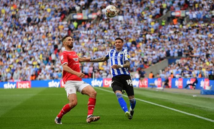 Barnsley v Sheffield Wednesday, London, UK - 29 May 2023 Adam Phillips of Barnsley challenges for the ball with Marvin Johnson of Sheffield Wednesday during the Sky Bet League One Play-Off Final between Barnsley and Sheffield Wednesday on 29th May 2023 at Wembley Stadium, London London Wembley Stadium London GBR Copyright: xFrankiexOKeeffe PPAUKx PPA-033445