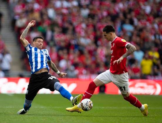 Barnsley v Sheffield Wednesday Sky Bet League 1 Matty Wolfe of Barnsley is tackled by Marvin Johnson of Sheffield Wednesday during the Sky Bet League 1 Play Off Final between Barnsley and Sheffield Wednesday at Wembley Stadium, London Content Not Available For UK Newspapers Copyright: xBenxPetersx FIL-18555-0036 UK Newspapers OUT