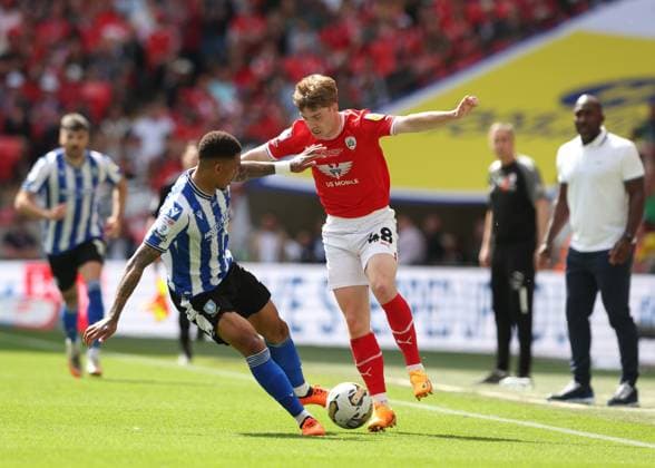 29th May 2023; Wembley Stadium, London, England; EFL League One Play Off Football Final, Barnsley versus Sheffield Wednesday; Luca Connell of Barnsley challenged by Liam Palmer of Sheffield Wednesday  ActionPlus12515564 JohnxPatrickxFletcher