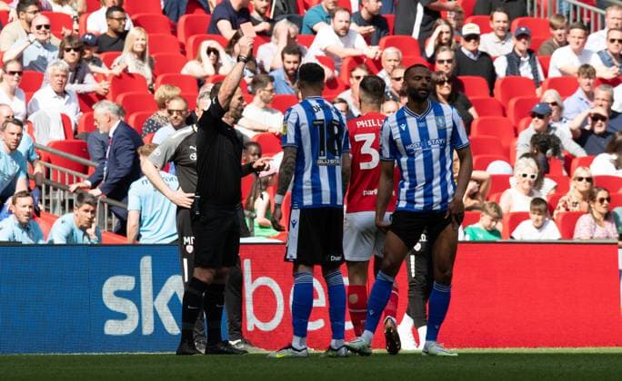 Adam Phillips of Barnsley is shown the red card by referee Tim Robinson during the Sky Bet League 1 play off final match between Barnsley and Sheffield Wednesday at Wembley Stadium, London, England on 28 May 2023. Copyright: xAlanxStanfordx PMI-5573-0092