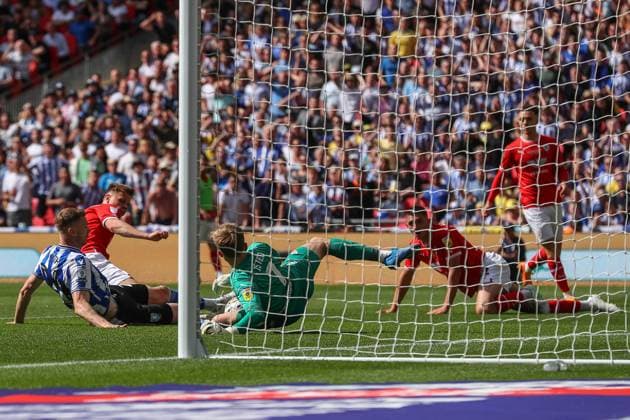 Sky Bet League 1 Play-off Final Barnsley v Sheffield Wednesday Harvey Isted 1 of Barnsley saves a shot on goal from Robbie Cundy 24 of Barnsley during the Sky Bet League 1 Play-off Final match Barnsley vs Sheffield Wednesday at Wembley Stadium, London, United Kingdom, 29th May 2023 (Photo by Gareth Evans News Images) London Wembley Stadium Greater London United Kingdom Copyright: xGarethxEvans NewsxImagesx