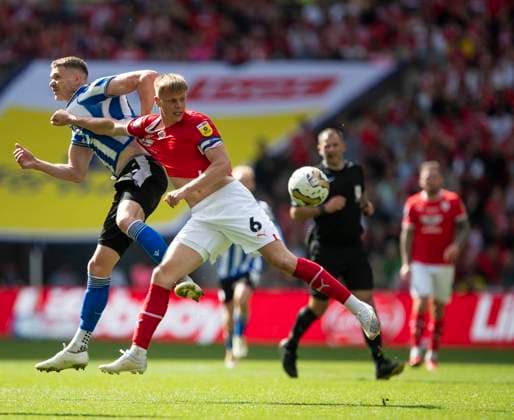 Barnsley v Sheffield Wednesday Sky Bet League 1 Mads Andersen of Barnsley battles with Michael Smith of Sheffield Wednesday during the Sky Bet League 1 Play Off Final between Barnsley and Sheffield Wednesday at Wembley Stadium, London Content Not Available For UK Newspapers Copyright: xBenxPetersx FIL-18555-0060 UK Newspapers OUT