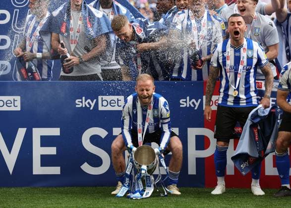 29th May 2023; Wembley Stadium, London, England; EFL League One Play Off Football Final, Barnsley versus Sheffield Wednesday; Barry Bannan of Sheffield Wednesday lifts the EFL League One Play Off trophy  ActionPlus12515662 JohnxPatrickxFletcher