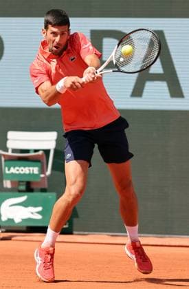 Serbian Novak Djokovic returns the ball to Aleksandar Kovacevic of the US during their first-round match at Roland Garros French Tennis Open in Paris, France, on Monday, May 29, 2023. Djokovic won 6-3, 6-2, 7-6.  PAR20230529520 MAYAxVIDON-WHITE