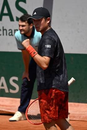 (230530) -- PARIS, May 30, 2023 -- Wu Yibing of China celebrates during the men s singles first round match against Roberto Bautista Agut of Spain at the French Open tennis tournament at Roland Garros in Paris, France, May 29, 2023. (Photo by Xinhua) (SP)FRANCE-PARIS-TENNIS-ROLAND GARROS-FRENCH OPEN-MEN S SINGLES JulienxMattia 