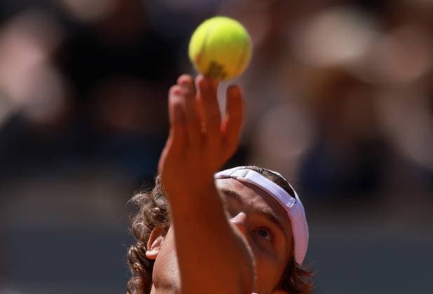 (230530) -- PARIS, May 30, 2023 -- Aleksandar Kovacevic of the United States serves during the men s singles first round match between Novak Djokovic of Serbia and Aleksandar Kovacevic of the United States at the French Open tennis tournament at Roland Garros in Paris, France, on May 29, 2023. ) (SP)FRANCE-PARIS-TENNIS-ROLAND GARROS-FRENCH OPEN-MEN S SINGLES GaoxJing 
