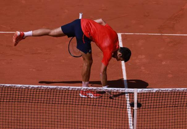 (230530) -- PARIS, May 30, 2023 -- Novak Djokovic of Serbia celebrates his victory after the men s singles first round match between Novak Djokovic of Serbia and Aleksandar Kovacevic of the United States at the French Open tennis tournament at Roland Garros in Paris, France, on May 29, 2023. ) (SP)FRANCE-PARIS-TENNIS-ROLAND GARROS-FRENCH OPEN-MEN S SINGLES GaoxJing 