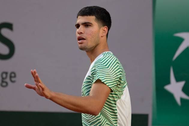 (230530) -- PARIS, May 30, 2023 -- Carlos Alcaraz of Spain reacts during the men s singles first round match between Carlos Alcaraz of Spain and Flavio Cobolli of Italy at the French Open tennis tournament at Roland Garros in Paris, France, on May 29, 2023. (Photo by Xinhua) (SP)FRANCE-PARIS-TENNIS-ROLAND GARROS-FRENCH OPEN-MEN S SINGLES JulienxMattia 