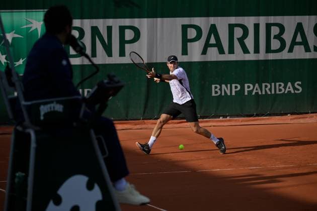 (230530) -- PARIS, May 30, 2023 -- Susan Lajovic of Serbia hits a return during the men s singles first round match against Zhang Zhizhen of China at the French Open tennis tournament at Roland Garros in Paris, France, May 29, 2023. (Photo by Xinhua) (SP)FRANCE-PARIS-TENNIS-ROLAND GARROS-FRENCH OPEN-MEN S SINGLES JulienxMattia 