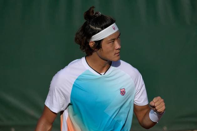 (230530) -- PARIS, May 30, 2023 -- Zhang Zhizhen of China celebrates during the men s singles first round match against Susan Lajovic of Serbia at the French Open tennis tournament at Roland Garros in Paris, France, May 29, 2023. (Photo by Xinhua) (SP)FRANCE-PARIS-TENNIS-ROLAND GARROS-FRENCH OPEN-MEN S SINGLES JulienxMattia 
