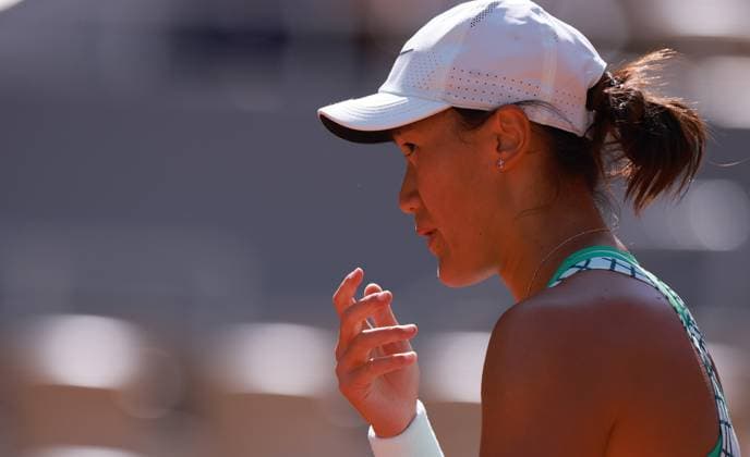 (230530) -- PARIS, May 30, 2023 -- Wang Xiyu of China reacts during the women s singles first round match between Wang Xiyu of China and Caroline Garcia of France at the French Open tennis tournament at Roland Garros in Paris, France, on May 29, 2023. ) (SP)FRANCE-PARIS-TENNIS-ROLAND GARROS-FRENCH OPEN-WOMEN S SINGLES GaoxJing 