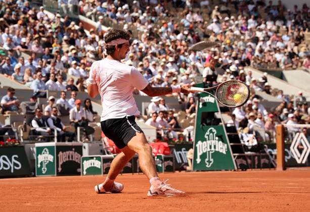 Thiago Seyboth Wild of Brazil returns the ball to world number 2 seeded Daniil Medvedev of Russia during their first-round match at Roland Garros French Tennis Open in Paris, France, on Tuesday, May 30, 2023. Seyboth Wild won 7-6, 6-7, 2-6, 6-3, 6-4.  PAR20230530131 MAYAxVIDON-WHITE