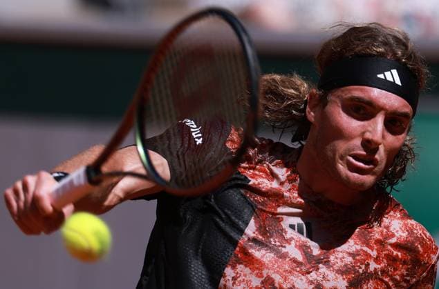 (230531) -- PARIS, May 31, 2023 -- Stefanos Tsitsipas hits a return during the men s singles second round match between Stefanos Tsitsipas of Greece and Roberto Carballes Baena of Spain at the French Open tennis tournament at Roland Garros in Paris, France, May 31, 2023. ) (SP)FRANCE-PARIS-TENNIS-ROLAND GARROS-FRENCH OPEN-MEN S SINGLES GaoxJing 