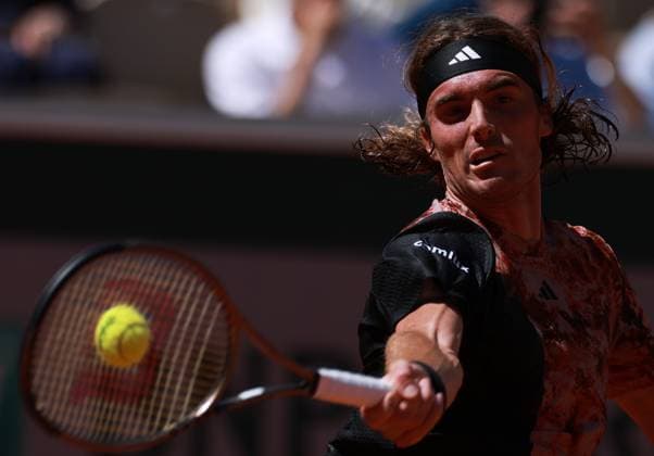 (230531) -- PARIS, May 31, 2023 -- Stefanos Tsitsipas hits a return during the men s singles second round match between Stefanos Tsitsipas of Greece and Roberto Carballes Baena of Spain at the French Open tennis tournament at Roland Garros in Paris, France, May 31, 2023. ) (SP)FRANCE-PARIS-TENNIS-ROLAND GARROS-FRENCH OPEN-MEN S SINGLES GaoxJing 