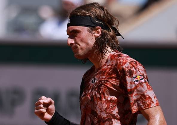 (230531) -- PARIS, May 31, 2023 -- Stefanos Tsitsipas reacts during the men s singles second round match between Stefanos Tsitsipas of Greece and Roberto Carballes Baena of Spain at the French Open tennis tournament at Roland Garros in Paris, France, May 31, 2023. ) (SP)FRANCE-PARIS-TENNIS-ROLAND GARROS-FRENCH OPEN-MEN S SINGLES GaoxJing 
