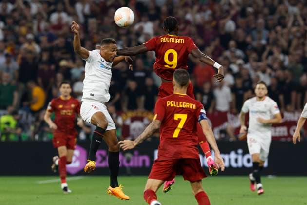 AS Roma s striker Tammy Abraham (2-R) vies for the ball with Sevilla s midfielder Fernando Reges (L) during the UEFA Europa League final soccer match between Sevilla FC and AS Roma at Ferenc Puskas Stadium in Budapest, Hungary, 31 May 2023. UEFA Europa League Final - Sevilla FC vs. AS Roma !ACHTUNG: NUR REDAKTIONELLE NUTZUNG!  Copyright: xJulioxMunozx GRAF1026 20230531-6c73f0a2253d1242b3c7e7c75efa2f81026c361c