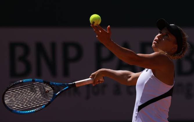 (230601) -- PARIS, June 1, 2023 -- Yulia Putintseva of Kazakhstan serves during the women s singles second round match between Zheng Qinwen of China and Yulia Putintseva of Kazakhstan at the French Open tennis tournament at Roland Garros in Paris, France, on May 31, 2023. ) (SP)FRANCE-PARIS-TENNIS-ROLAND GARROS-FRENCH OPEN-WOMEN S SINGLES GaoxJing 