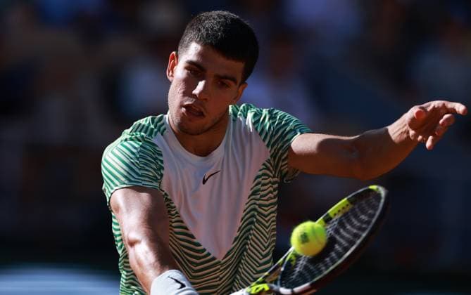 (230601) -- PARIS, June 1, 2023 -- Carlos Alcaraz of Spain hits a return during the men s singles second round match between Carlos Alcaraz of Spain and Taro Daniel of Japan at the French Open tennis tournament at Roland Garros in Paris, France, on May 31, 2023. ) (SP)FRANCE-PARIS-TENNIS-ROLAND GARROS-FRENCH OPEN-MEN S SINGLES GaoxJing 