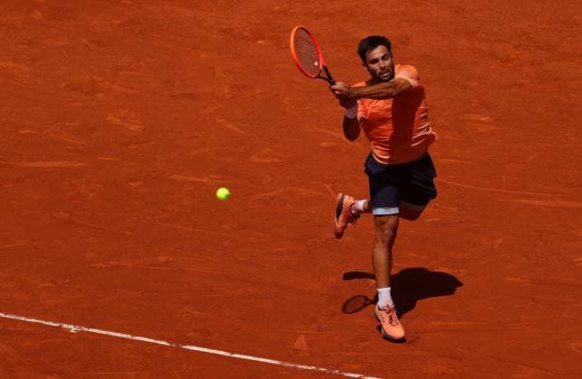Mandatory Credit: Photo by Ella Ling Shutterstock (13944033o) Genaro Alberto Olivieri of Argentina in action French Open Tennis, Day 7, Roland Garros, Paris, France - 03 June 2023 French Open Tennis, Day 7, Roland Garros, Paris, France - 03 June 2023  Copyright: xEllaxLing Shutterstockx 13944033o