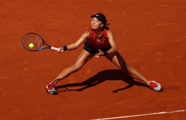 Mandatory Credit: Photo by Ella Ling Shutterstock (13944033ai) Xinyu Wang of China in action French Open Tennis, Day 7, Roland Garros, Paris, France - 03 June 2023 French Open Tennis, Day 7, Roland Garros, Paris, France - 03 June 2023  Copyright: xEllaxLing Shutterstockx 13944033ai