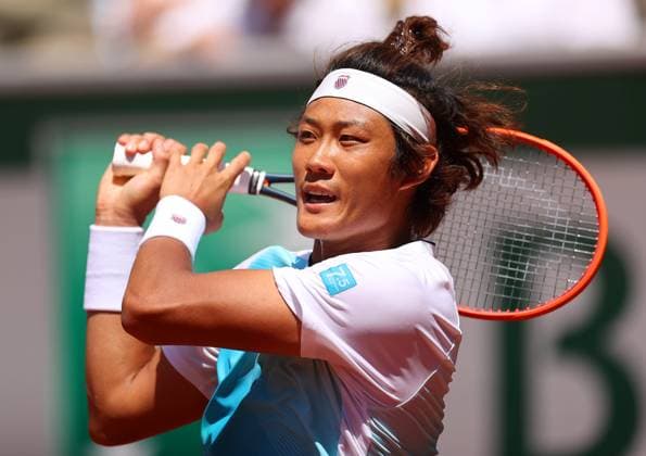 Mandatory Credit: Photo by Ella Ling Shutterstock (13944033cg) Zhizhen Zhang of China in action French Open Tennis, Day 7, Roland Garros, Paris, France - 03 June 2023 French Open Tennis, Day 7, Roland Garros, Paris, France - 03 June 2023  Copyright: xEllaxLing Shutterstockx 13944033cg