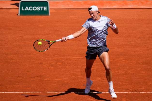 PARIS, FRANCE - JUNE 3: Holger Rune plays a forehand during the 3nd round of Roland Garros 2023 match at Roland Garros Stadium on June 3, 2023 in Paris, France. (Photo by Glenn Gervot Icon Sportswire) TENNIS: JUN 03 French Open EDITORIAL USE ONLY Icon2306034540