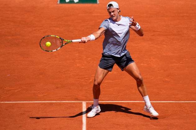 PARIS, FRANCE - JUNE 3: Holger Rune plays a forehand during the 3nd round of Roland Garros 2023 match at Roland Garros Stadium on June 3, 2023 in Paris, France. (Photo by Glenn Gervot Icon Sportswire) TENNIS: JUN 03 French Open EDITORIAL USE ONLY Icon2306034552