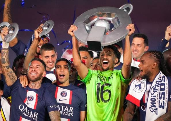 Marquinhos of PSG lifts the Ligue 1 winning trophy 2022 23 during post match celebrations after the Ligue 1 match between Paris Saint Germain and Clermont Foot at Parc des Princes, Paris, France on 3 June 2023. Copyright: xAndyxRowlandx PMI-5577-0006