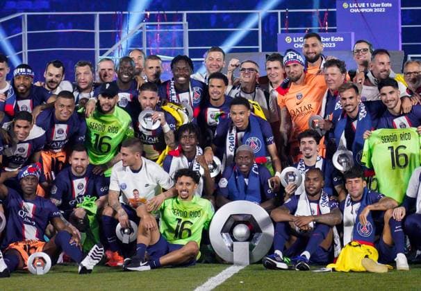 PSG players pose with a trophy after winning the 2022 23 Ligue 1 season during the Ligue 1 match between Paris Saint Germain and Clermont Foot at Parc des Princes, Paris, France on 3 June 2023. Copyright: xAndyxRowlandx PMI-5577-0016
