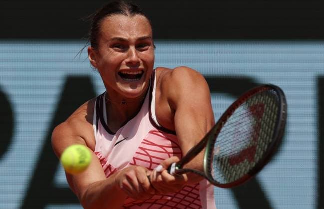 (230606) -- PARIS, June 6, 2023 -- Aryna Sabalenka of Belarus hits a return during the women s singles quarterfinals between Aryna Sabalenka of Belarus and Elina Svitolina of Ukraine at the French Open tennis tournament at Roland Garros in Paris, France, on June 6, 2023. ) (SP)FRANCE-PARIS-TENNIS-ROLAND GARROS-FRENCH OPEN-WOMEN S SINGLES GaoxJing 